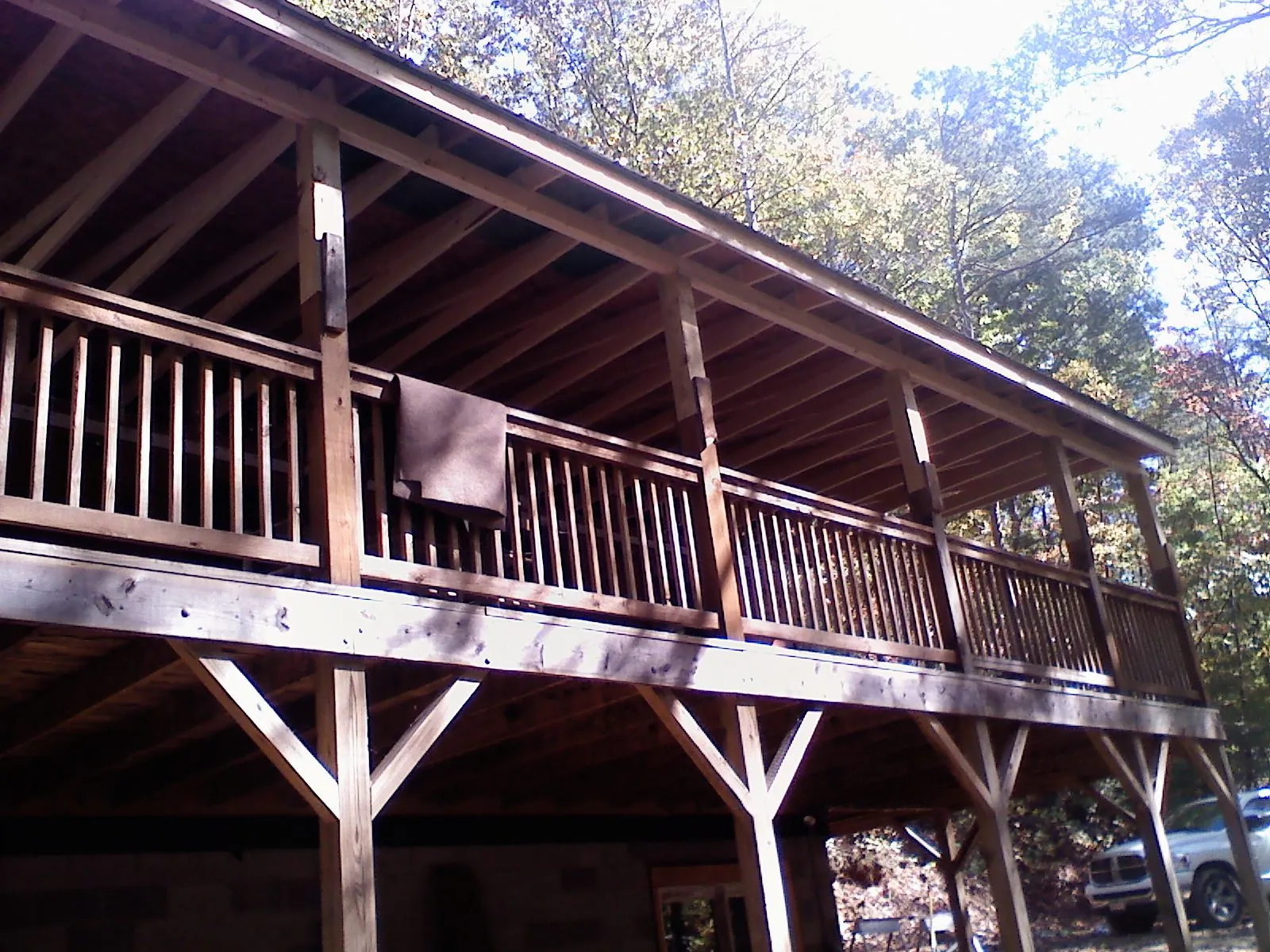 Timber framing under a new elevated porch and deck — Roof Leak Repair in Mesick by Roofing Brothers
